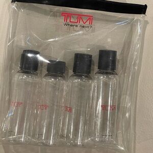 TUMI Clear Travel Bottle Set with Black Caps